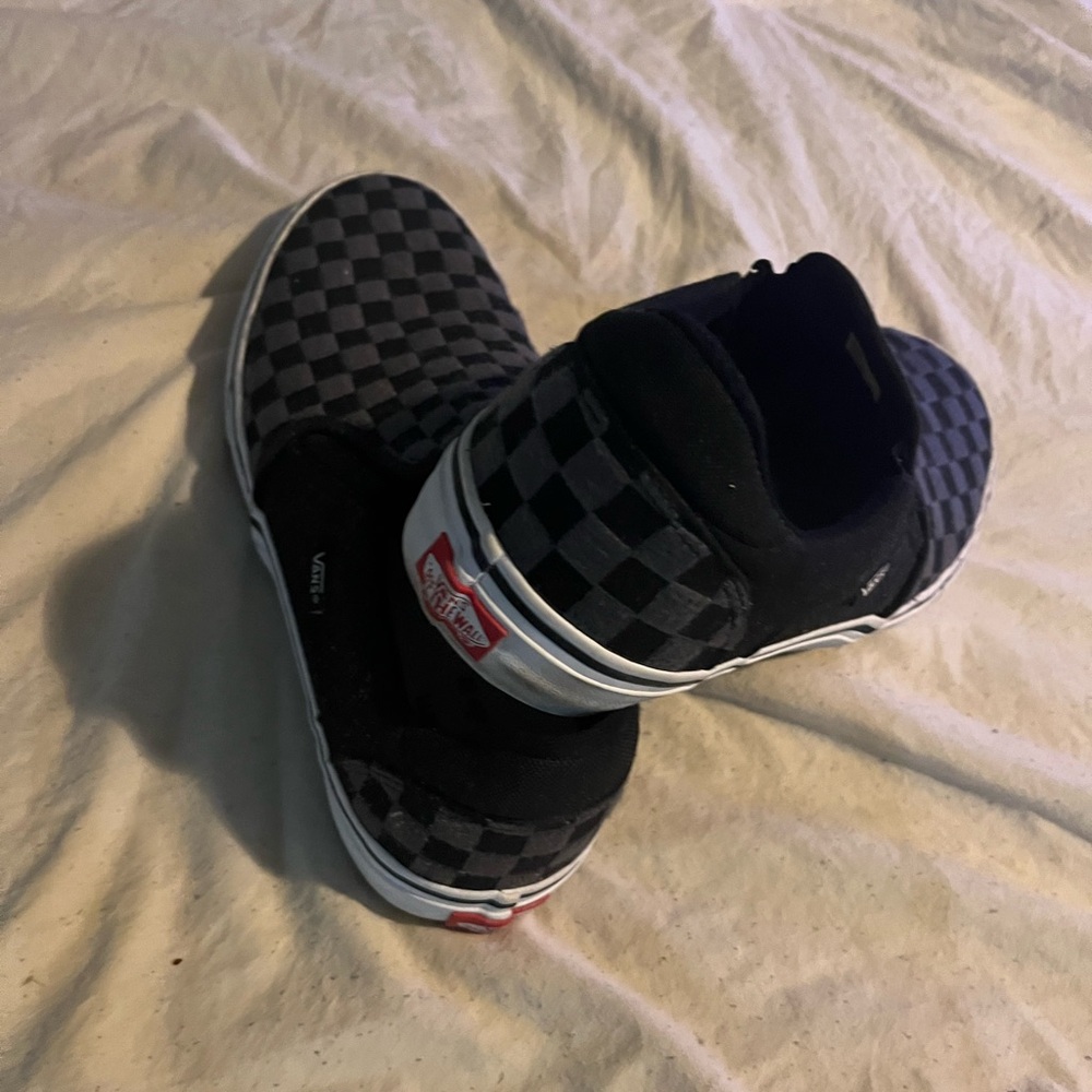 Vans men’s  Black Checkered Slip-On Sneakers